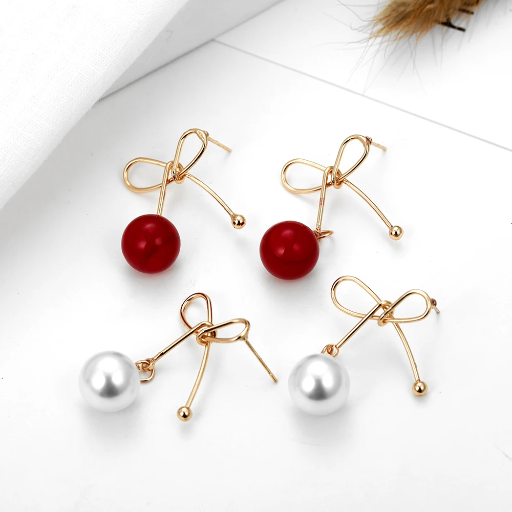 Женские серьги-подвески с круглым жемчугом золотистые металлические витые