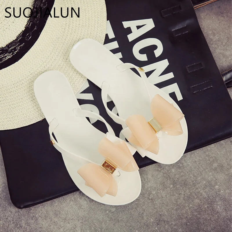 Женские шлепанцы на плоской подошве SUOJIALUN прозрачные с бантом лето 2019|fashion