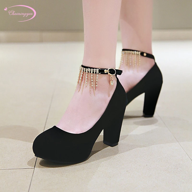 

Chinese party style comfortable flock round toe pumps fashion tassel diamond chain buckle heels chunky women shoes