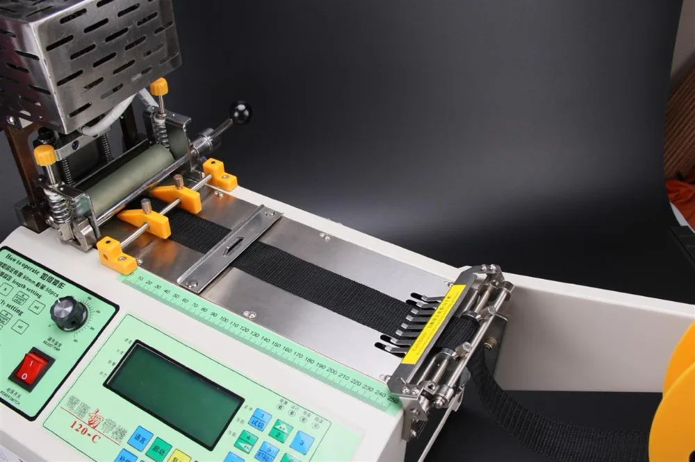 120-C computer automatic Cloth belt Oblique hot cutting machine, tape zipper Nylon webbing elastic belt cutting