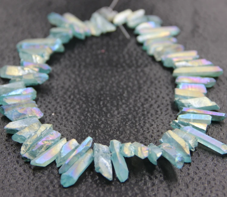 

Approx 70pcs/strand Natural Rainbow Aqua Quartz Crystal Point Pendant Rough Top Drilled Spike Stick Gem Beads Crystal Necklace