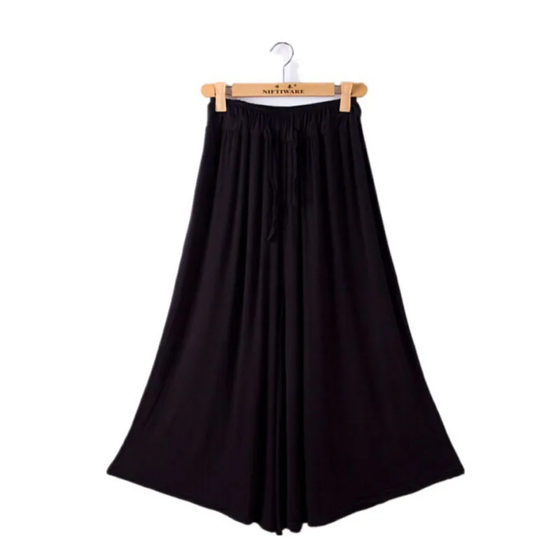 Женские летние широкие брюки однотонные свободные из модала больших размеров с