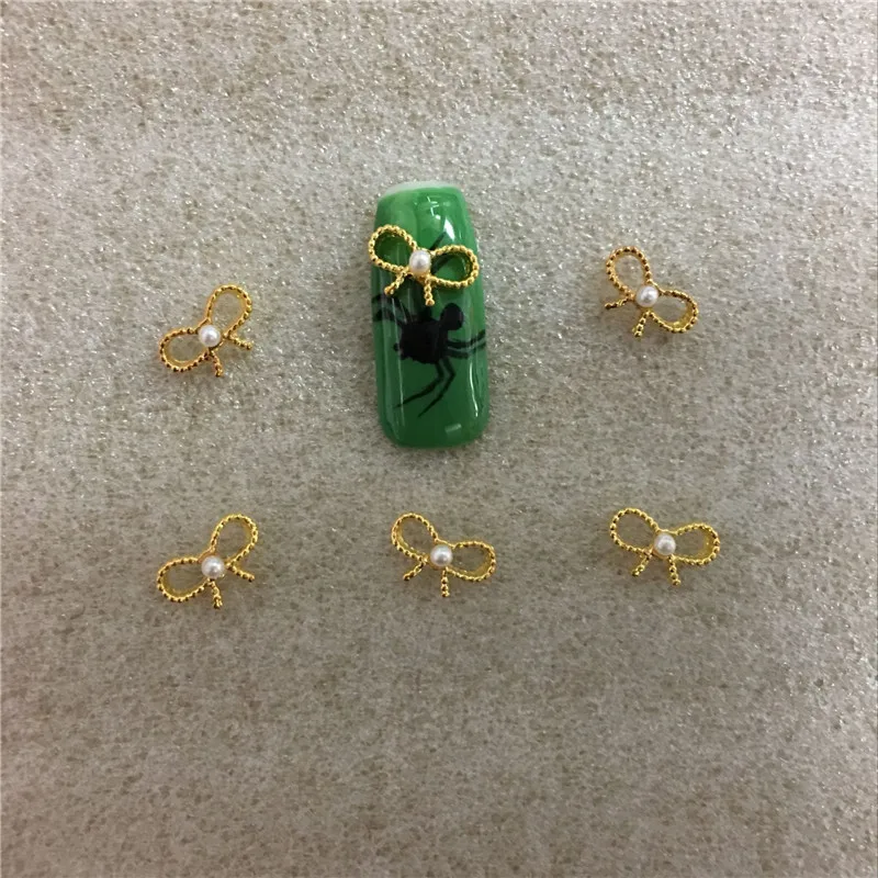 

10 Pcs/bag Pearl Bow Nail Alloy Jewelry A Diamond Rhinestone Art Glitter 3D Nail Art Decoration Joias Tools NO.45