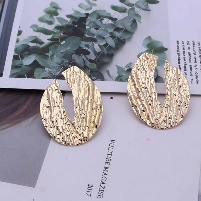 

Novel Handmade Leaves Plant Wholesale Punk Earrings Gold Color Statement Earrings Low Price Ear Accessories Round Jewelry