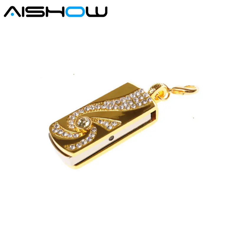 Металлическими элементами и стразами золотого цвета из нержавеющей стали