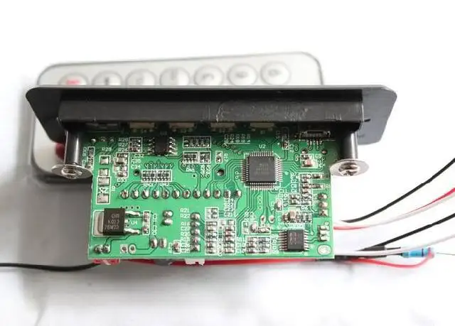 

New MP3 Audio Decoder board LED Remote control + FM Radio 5V/12V FOR CAR