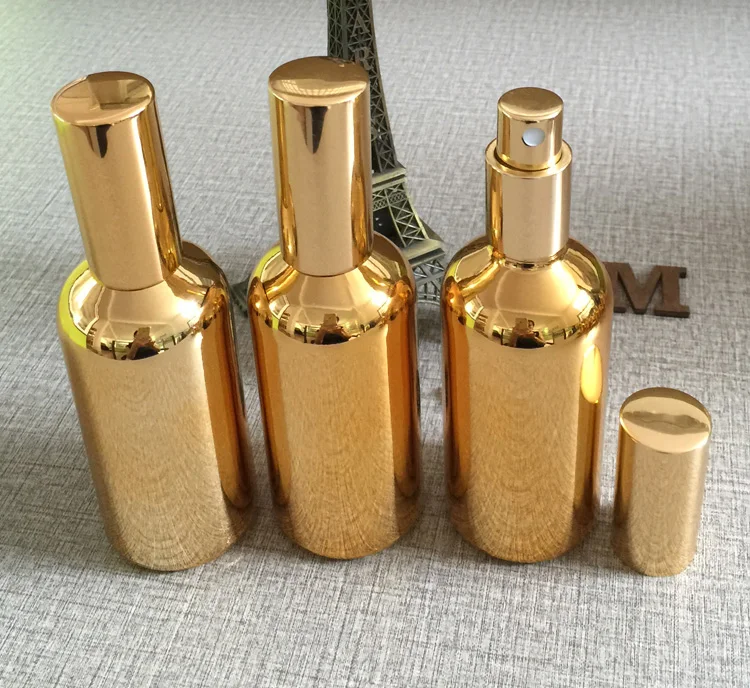 

50pieces/lot 100ml High temperature gold plated refillable empty spray perfume bottle,100ml glass gold perfume spray container