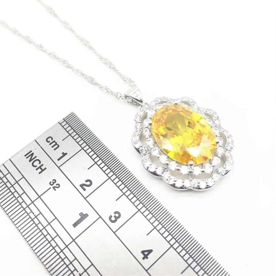 Женский ювелирный комплект из серебра 925 пробы с круглым желтым кристаллом |