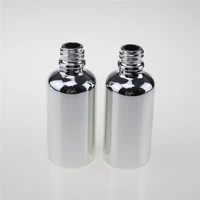 100pcs hot 50ml glass essential oil bottle with ribbed cap wholesale empty sub bottling uv electroplating silver glass bottle