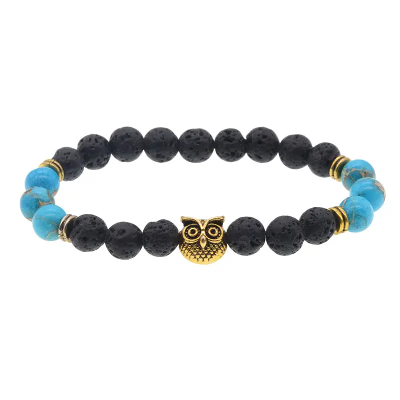 Браслет в античном стиле золотистого цвета с изображением головы совы 2018
