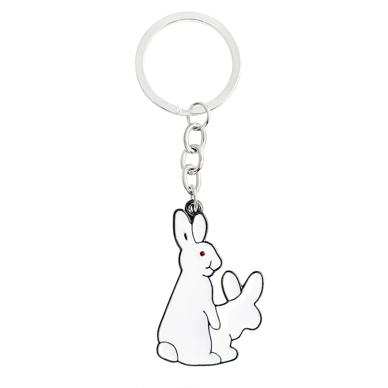 

1PC Cute Couple Lovers Enamel White Sexy Rabbits Keychain for Lovers Funny Gift