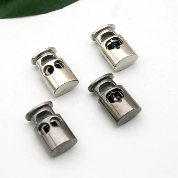 

DIY 30pcs/lot oval metal alloy stoppers toggle cord locks Drawstring lock two holes for 4mm bungee shock cord STP-014