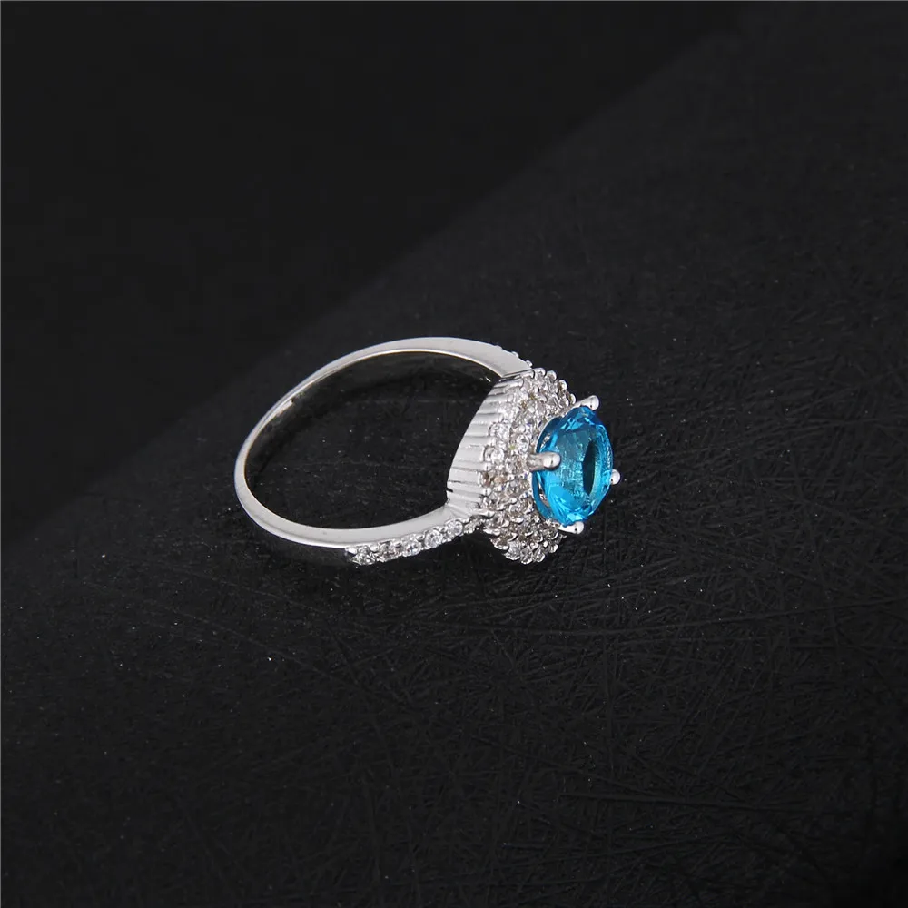 Женское кольцо с круглыми синими кристаллами серебряное винтажное для помолвки