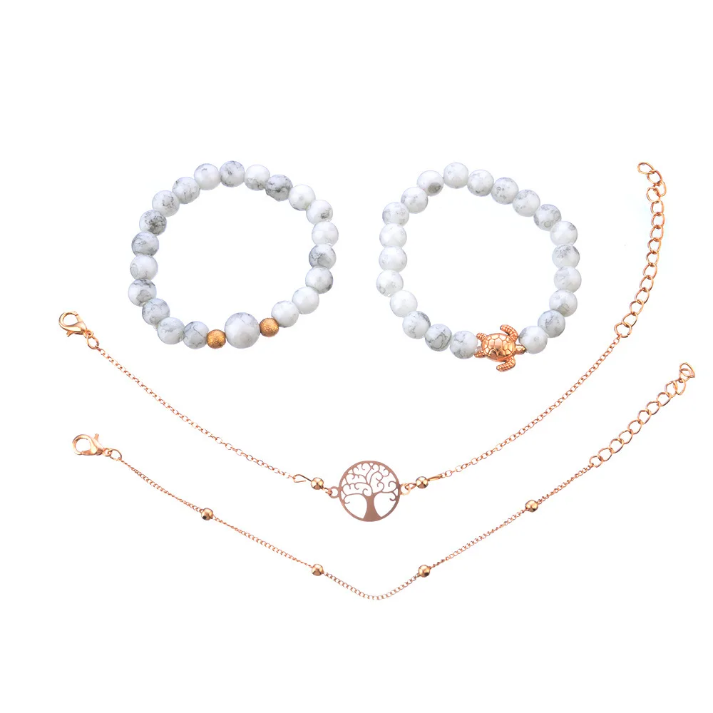 Упаковка из 4 браслетов с искусственным камнем и металлическими вырезанными