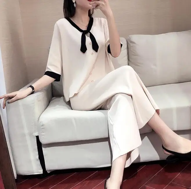 Женский трикотажный комплект из 2 предметов: топ с коротким рукавом и бантом