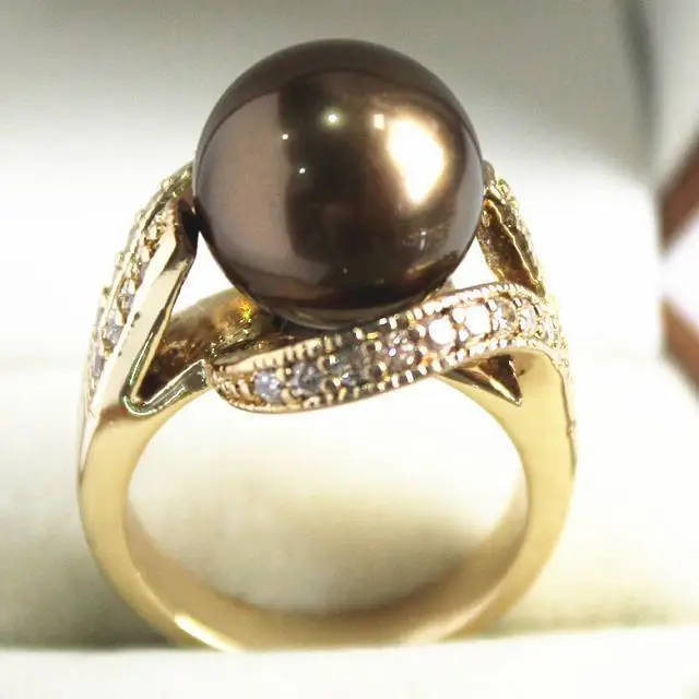 

Beautiful new jewelry 18KGP with crystal decorated &12mm brown shell pearl ring(#6.7.8.9)