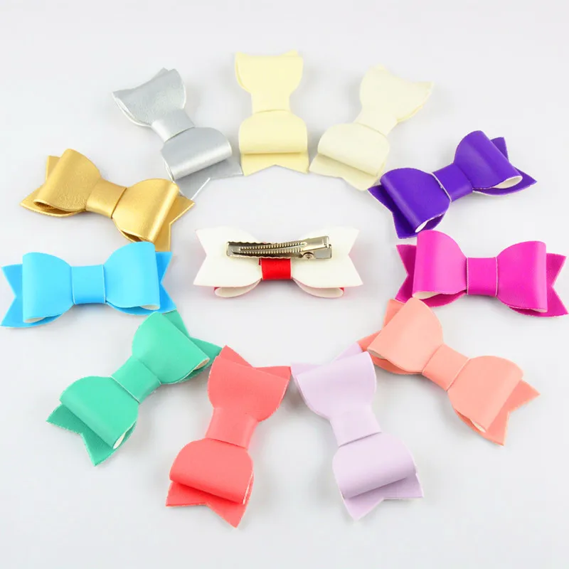 

10pcs / lot , 7.5 cm Wholesale children hair accessories PU leather felt bow with hairpin hair clip accessories