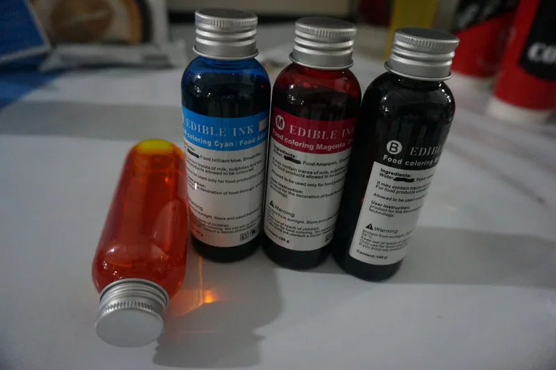 

2set /Lot , 4*100ml per set Edible ink for coffee Flatbed Printer to print coffee , cake , candy etc