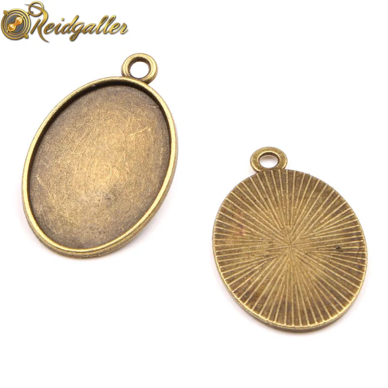 

reidgaller 20pcs antique bronze oval cabochon settings 18x25mm dia blank pendant tray diy jewelry base findings