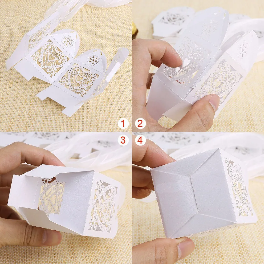 

wedding candy/chocolate box--Love Heart Laser Cut Candy Gift Boxes With Ribbon Wedding Party Favor Creative Favor Bags100pcs/lot