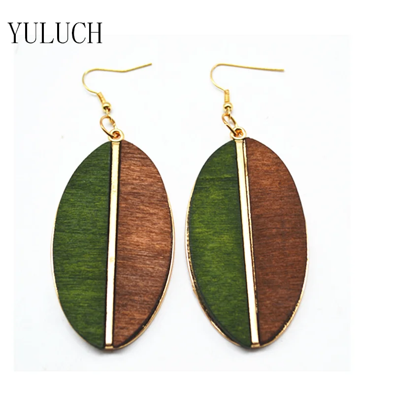 Женские деревянные серьги полукруглые минималистичные в форме листьев |
