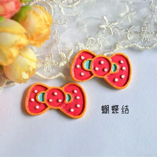 

50pcs/lot flat back resin pink bowknot Scrapbook Embellishment DIY Phone Decoration 20*32mm