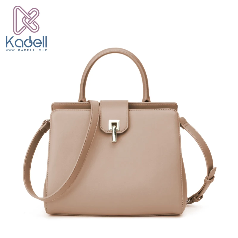 beige designer handbolsa