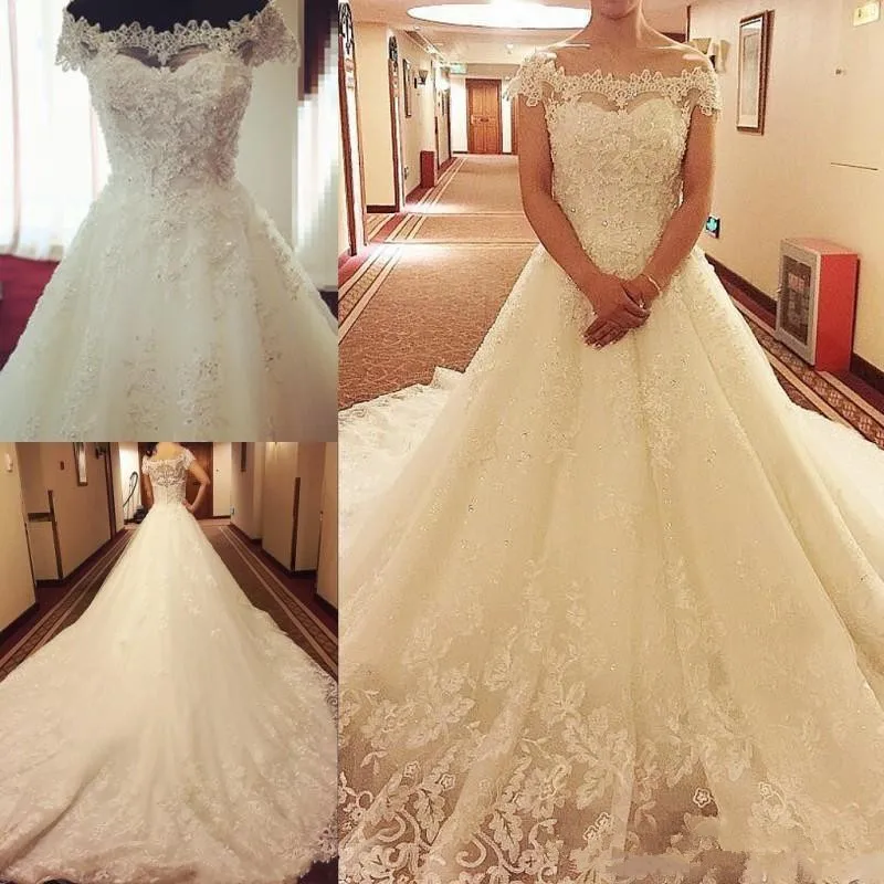 

Modest Lace Appliques A-Line Wedding Dresses With Short Sleeves Custom 2022 Bridal Gowns Chapel Train Garden Vestidos De Mariee