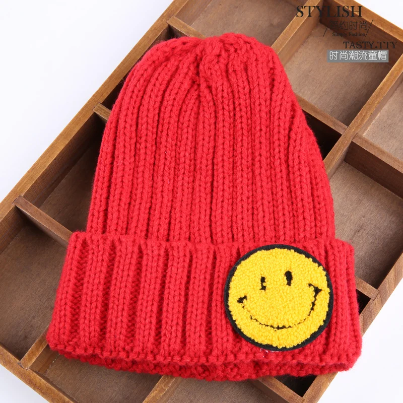 Лидер продаж зимние шапки для мальчиков и девочек однотонные теплые со смайликом