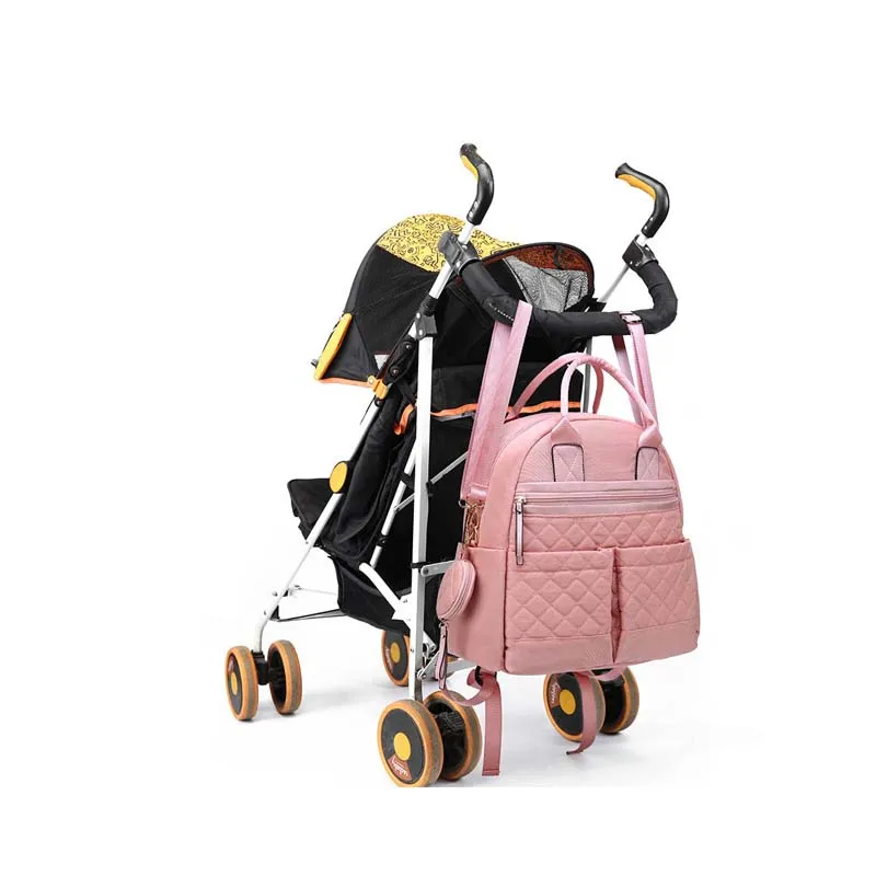 

Hot new fashion Mummy bag backpack 4 piece set waterproof nylon baby diaper bag simple handbag out of care storage bag