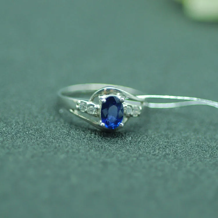 Кольцо из 18 каратного золота с платиновым сапфиром и натуральным сапфиром|gold