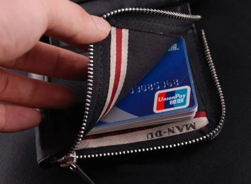 Мужской кошелек из высококачественной кожи с застежкой-молнией и отделением для