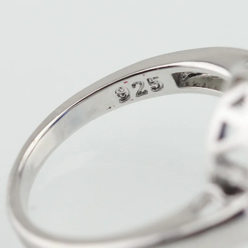 Женское кольцо с фианитом WPAITKYS серебряного цвета овальным синим кубическим