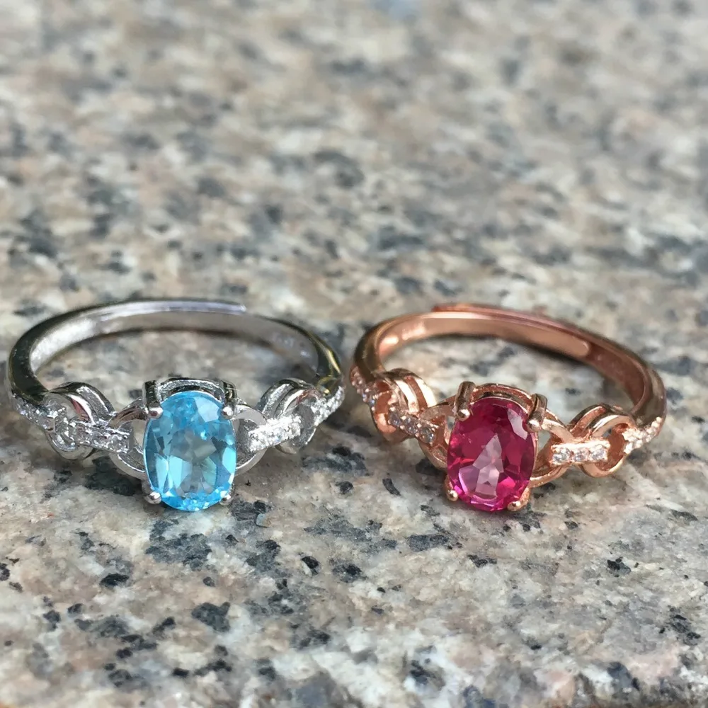 

KJJEAXCMY fine jewelry 925 sterling silver inlaid with blue powder topaz ring, ring and parcel post.