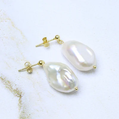 

Hepburn style elegant and natural baroque earrings creative hands ruffled skin baroque shaped pearl earrings Woman's Jewellery