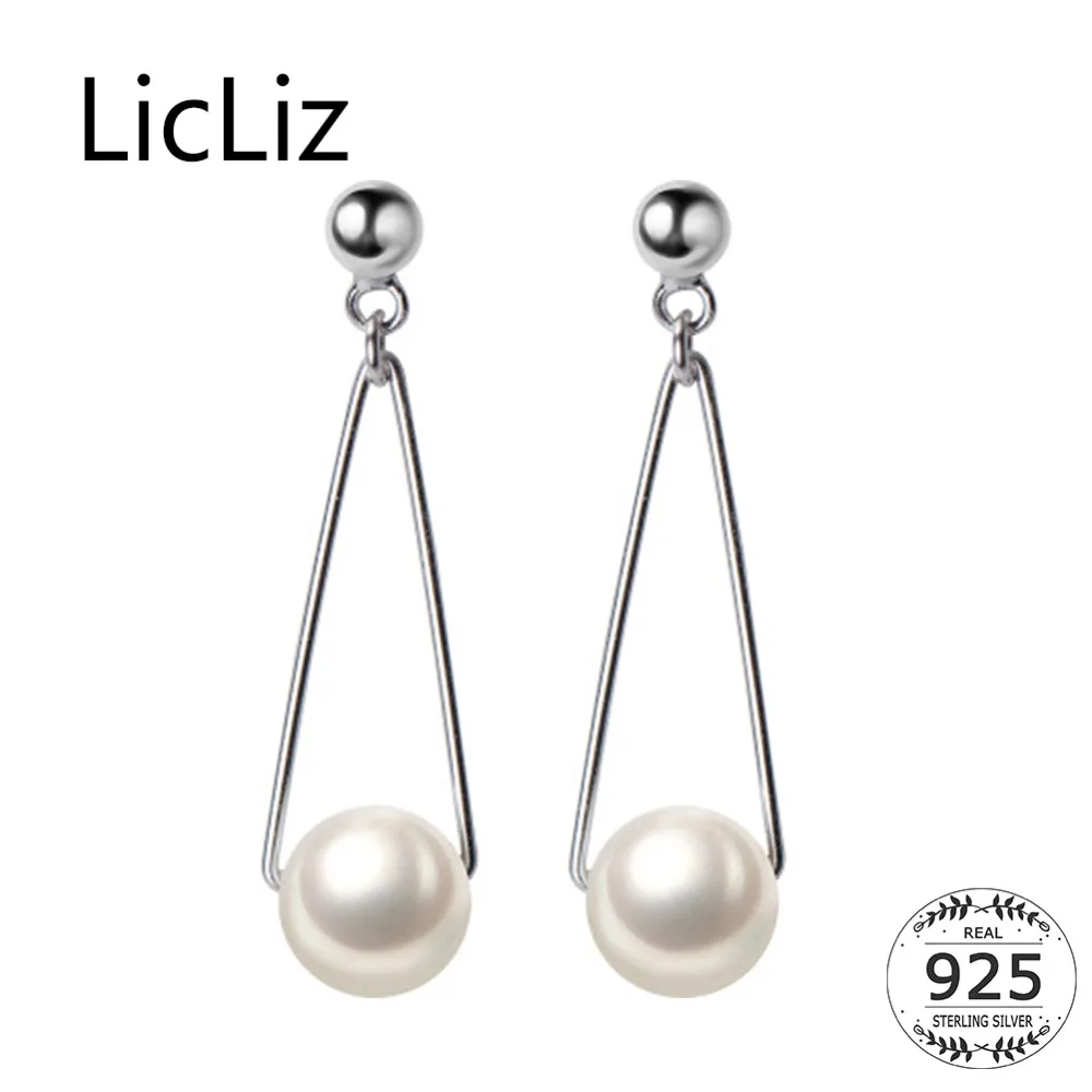 Женские серьги-подвески из белого золота с белым жемчугом | Украшения и