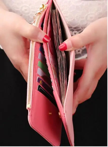 Длинный женский кожаный бумажник с бантиком от известного дизайнера держатель