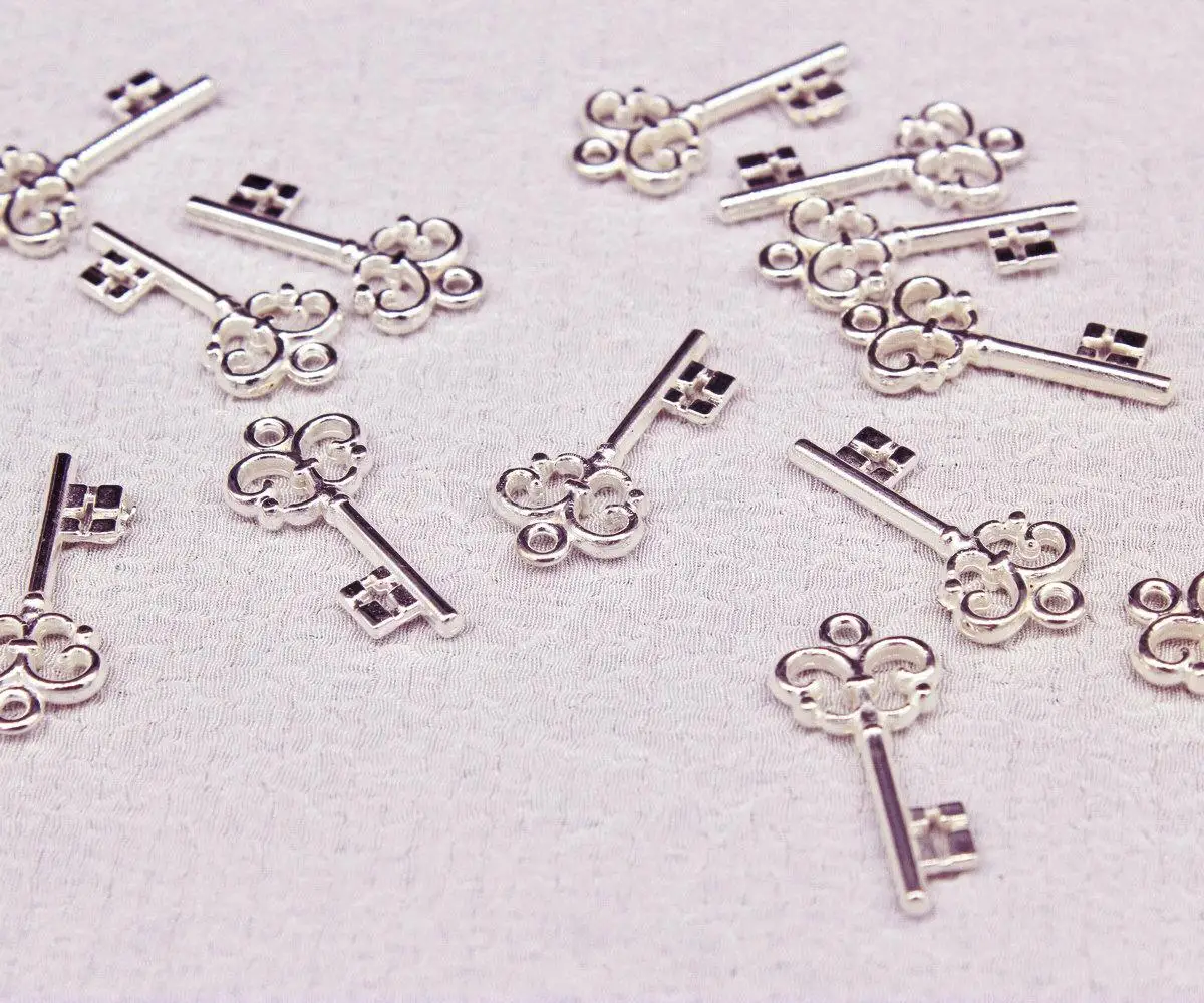 

600pcs shiny pretty key charm pendant silver color acrylic 25mm x 11mm