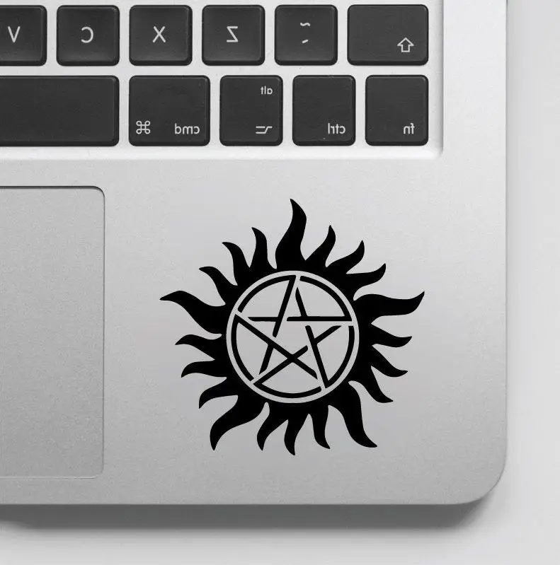 Огненное солнце обернутое звездами наклейка с изображением и графика для