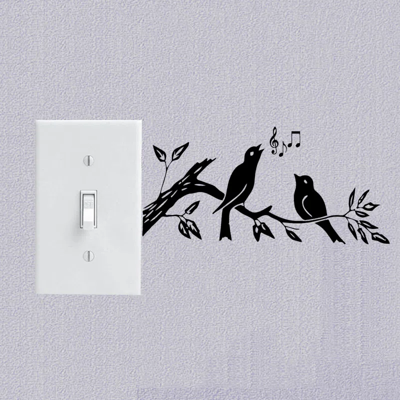 Птички на ветке с музыкальными нотами настенная виниловая наклейка выключатель