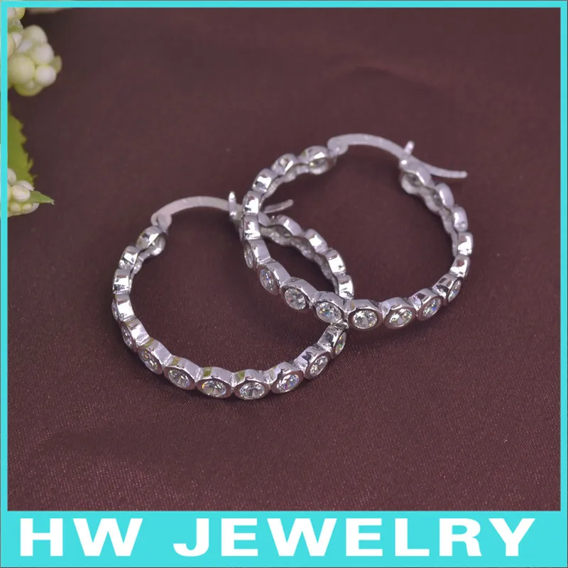 

fashion silver huggie hoop earring with cubic zirconia stones