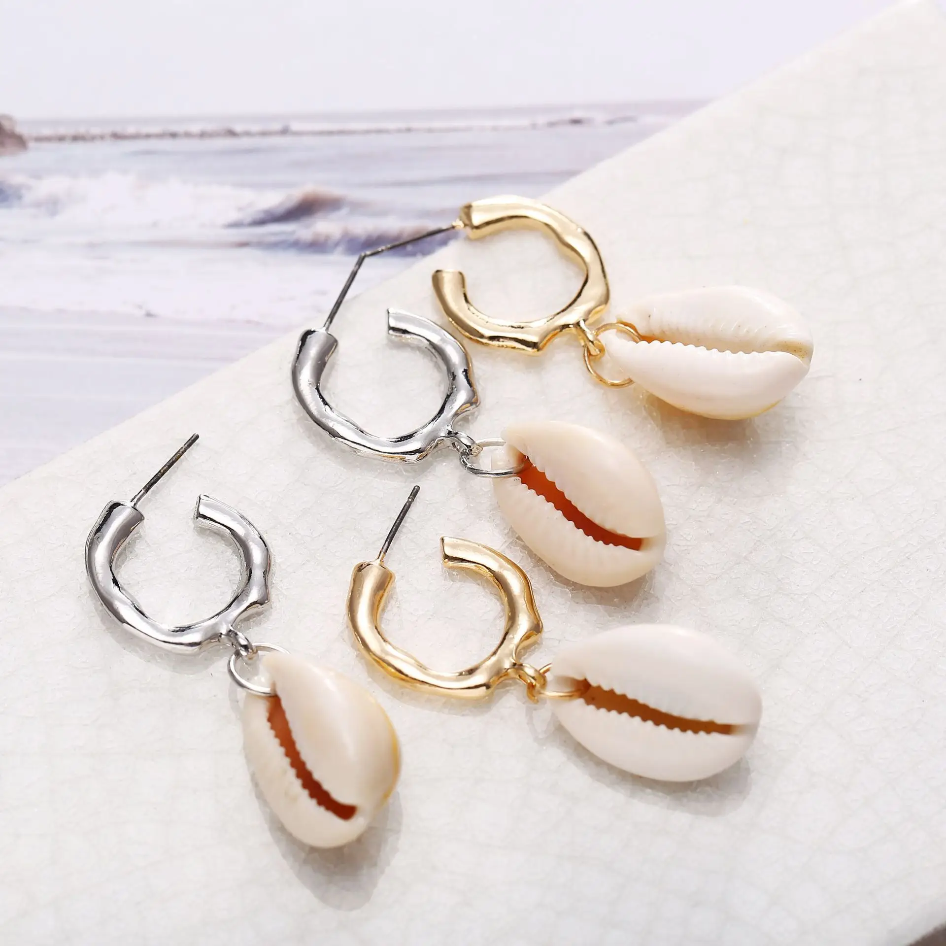 

Modyle 28 Style Sea Shell Earrings For Women Gold Silver Color Metal Shell Cowrie Statement Earrings 2019 Summer Beach Jewelry