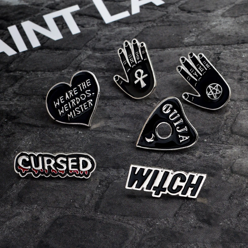 

Cartoon Black Hand Heart Brooch Cursed Ouija Witch We are the weirdos mister Pin Buckle Denim jacket Coat Pin Badge Jewelry Gift