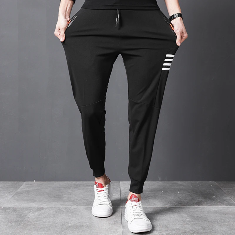 

Printed 2020 men's casual pants Teenagers nine points feet pants haroun pants