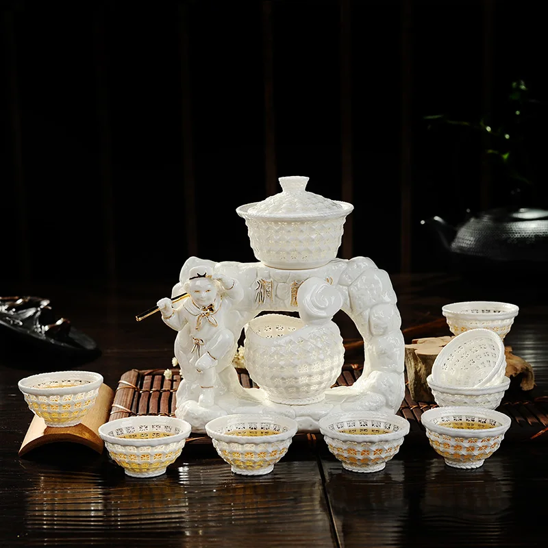 Pure hand woven exquisite tea set automatic crystal hollow ceramic bone China Kung Fu of high-end gift box | Обустройство дома