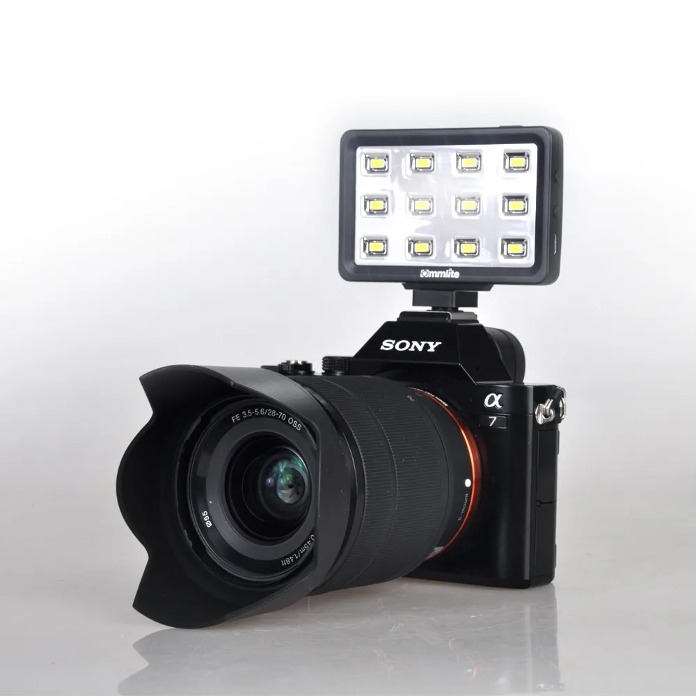 

Commlite 12 LED 5600k Portable Multi-Functional MINI LED Video Light with Cellphone Holder 2-3inches for Cellphone Pad DSLR