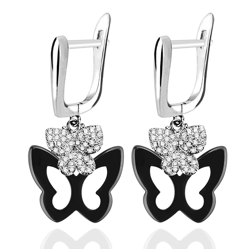 Комплект сережек бабочек с кристаллами черно белые керамические модные