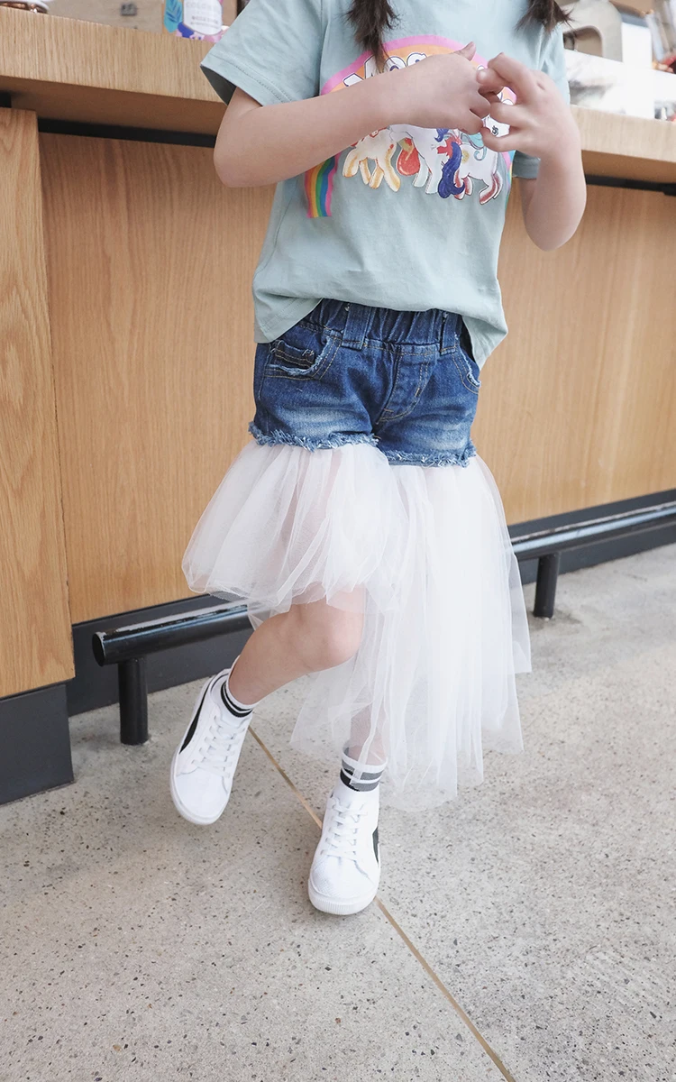 Модные шорты для девочек сшитая юбка весенние модели 2018 новые джинсовые с фальш