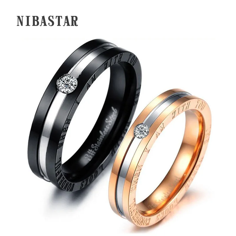 

Gold /Black Color Stainless Steel Crystal Couple Ring And Write Romantic Words " The World looks Wonderful When I am With You"