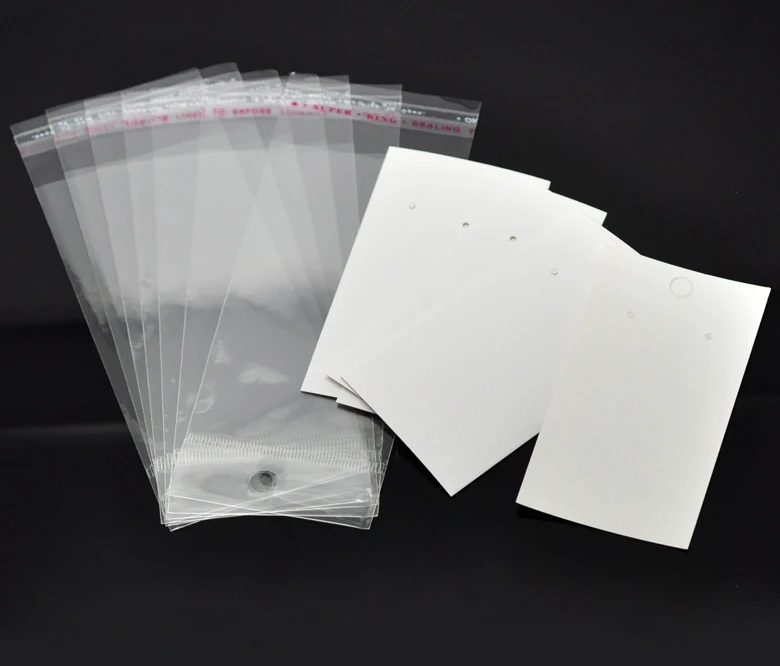 

DoreenBeads 15 Sets Ear Hooks Earring Display Cards 9cmx5cm W/ Self Adhesive Bags 15cmx6cm